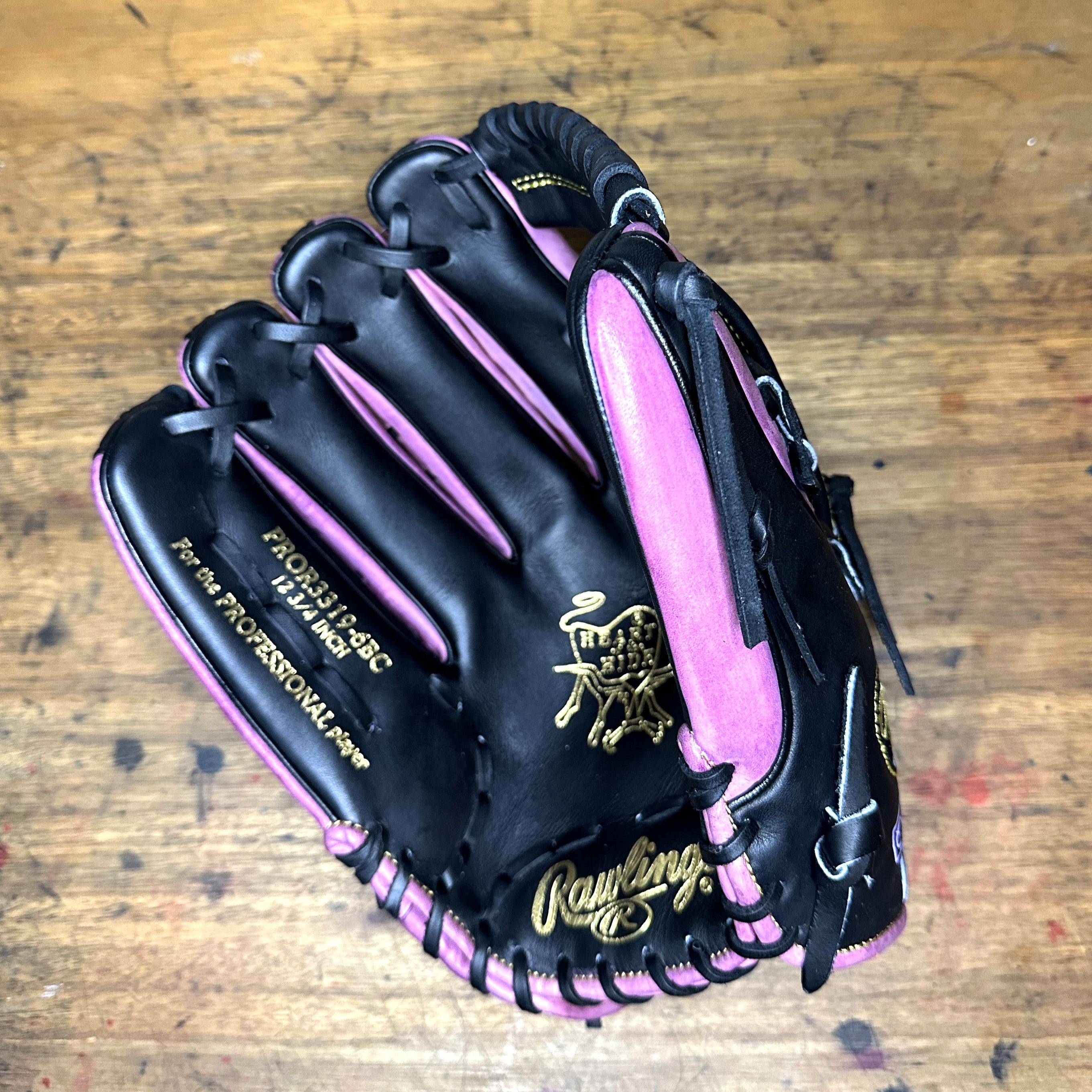 Custom Purple, Black, and Gold Rawlings PRO3319-6BC