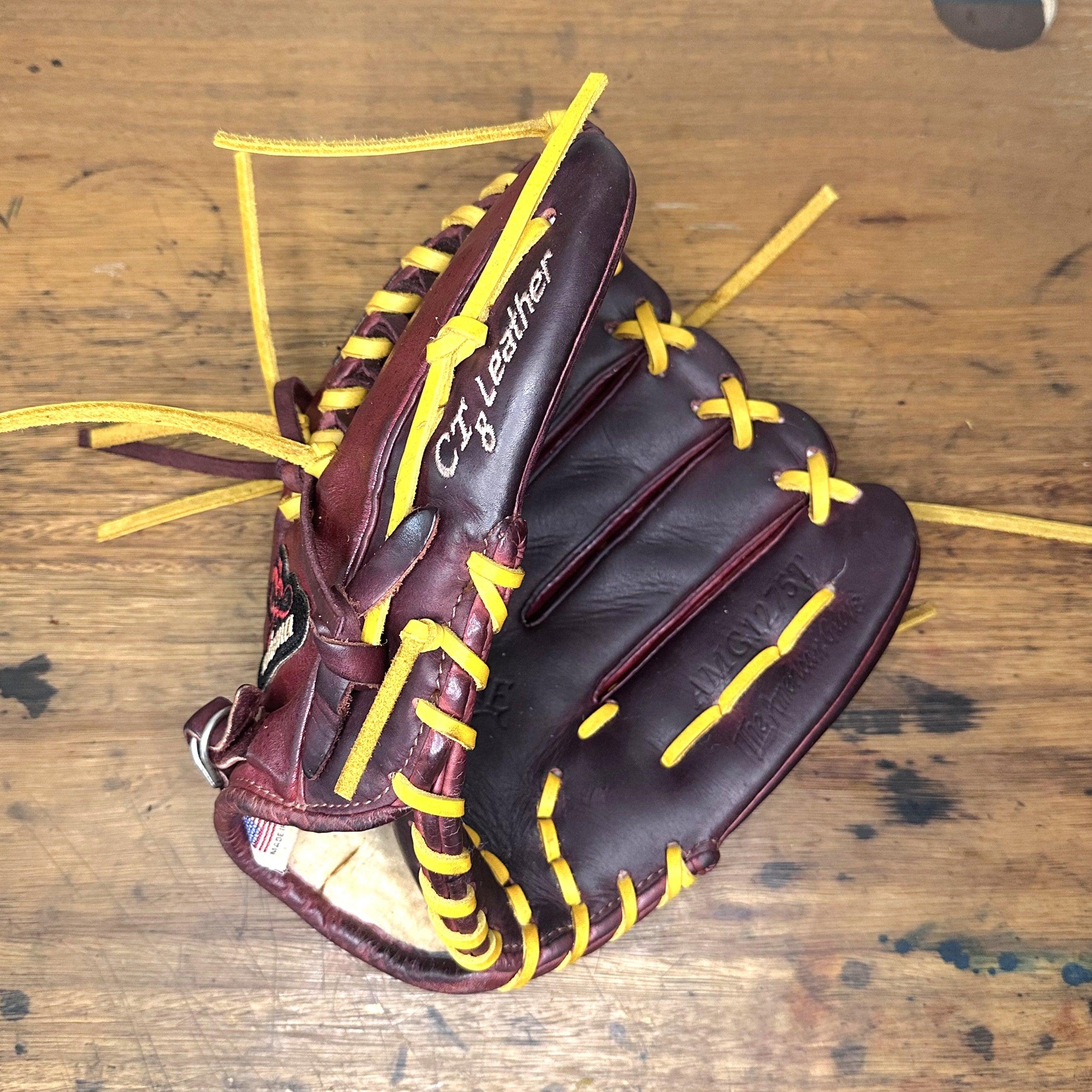 Nokona Bloodline Elite AMG1275T 12.75-inch custom restored outfield baseball glove professionally restored and relaced by The Craftsman's Works.