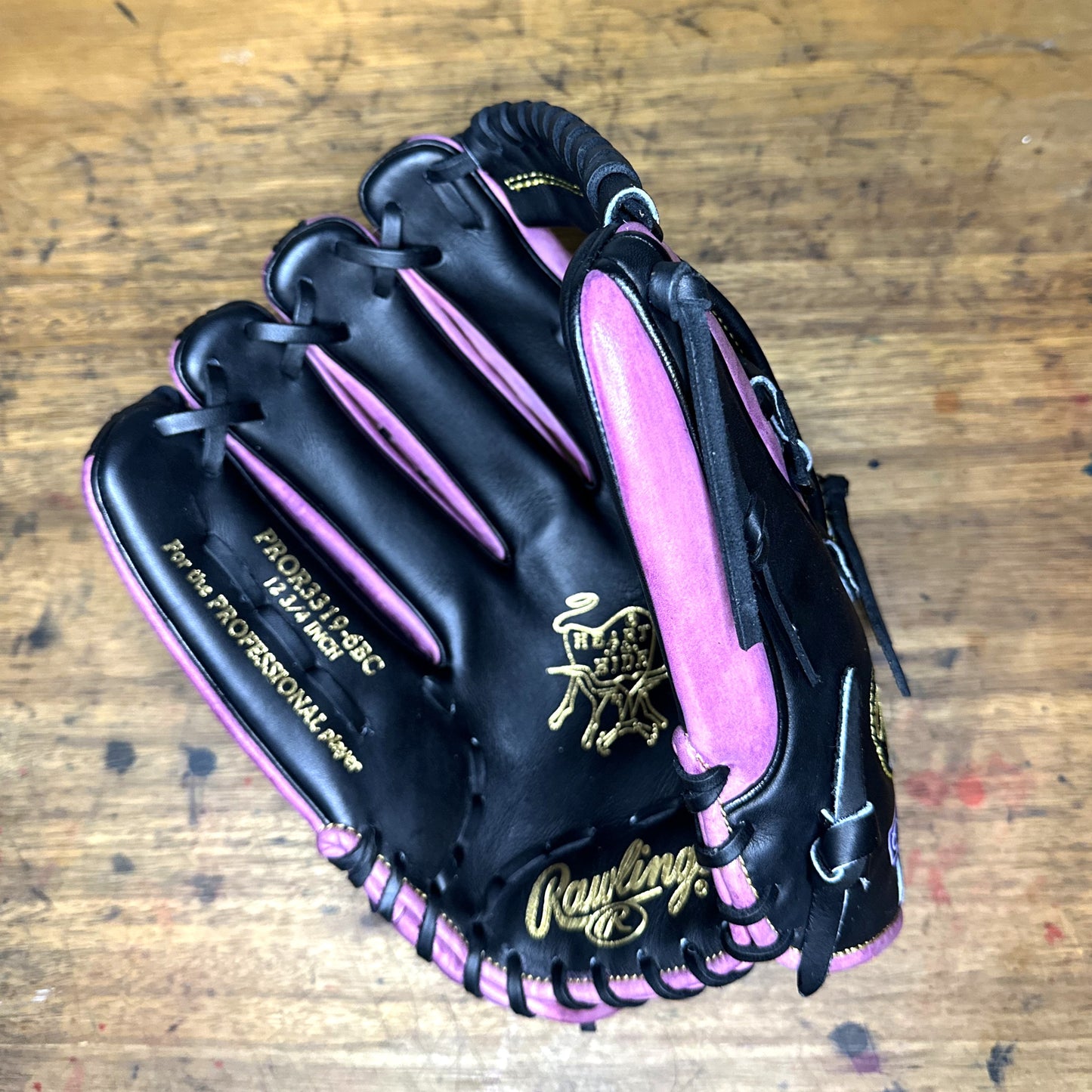 Custom Purple, Black, and Gold Rawlings PRO3319-6BC