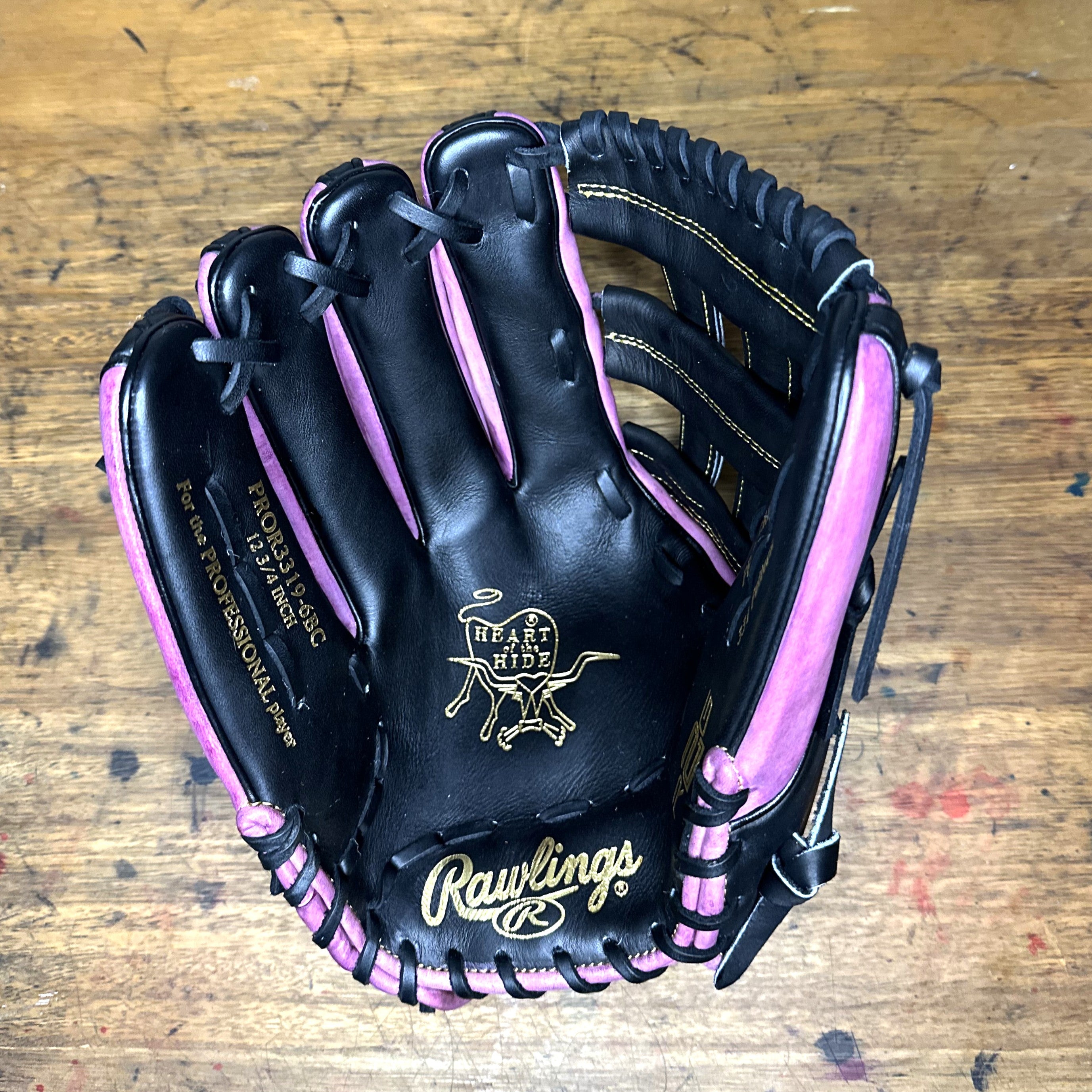 Custom Purple, Black, and Gold Rawlings PRO3319-6BC